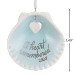 Hallmark A Heart Remembered 2023 Porcelain Ornament 10 Hallmark A Heart Remembered 2023 Porcelain Ornament -Hallmark shop A Heart Remembered Seashell Keepsake Ornament 1799QHX3037 03