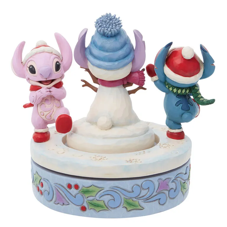 Enesco Jim Shore Disney Stitch And Angel Build A Snowman Rotating Figurine, 6" 4 Enesco Jim Shore Disney Stitch And Angel Build A Snowman Rotating Figurine, 6" - Image 2